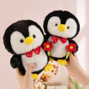 PINGÜINO MICHI CON ROSA 22CM