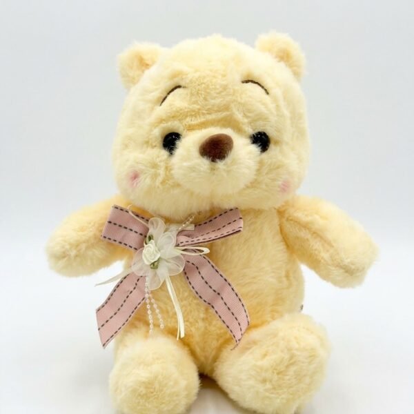 WINNIE POOH SENTADO LAZO 25CM